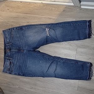 J Crew Mercantile blue denim, ripped jeans. Size 30. Raw edge on hem